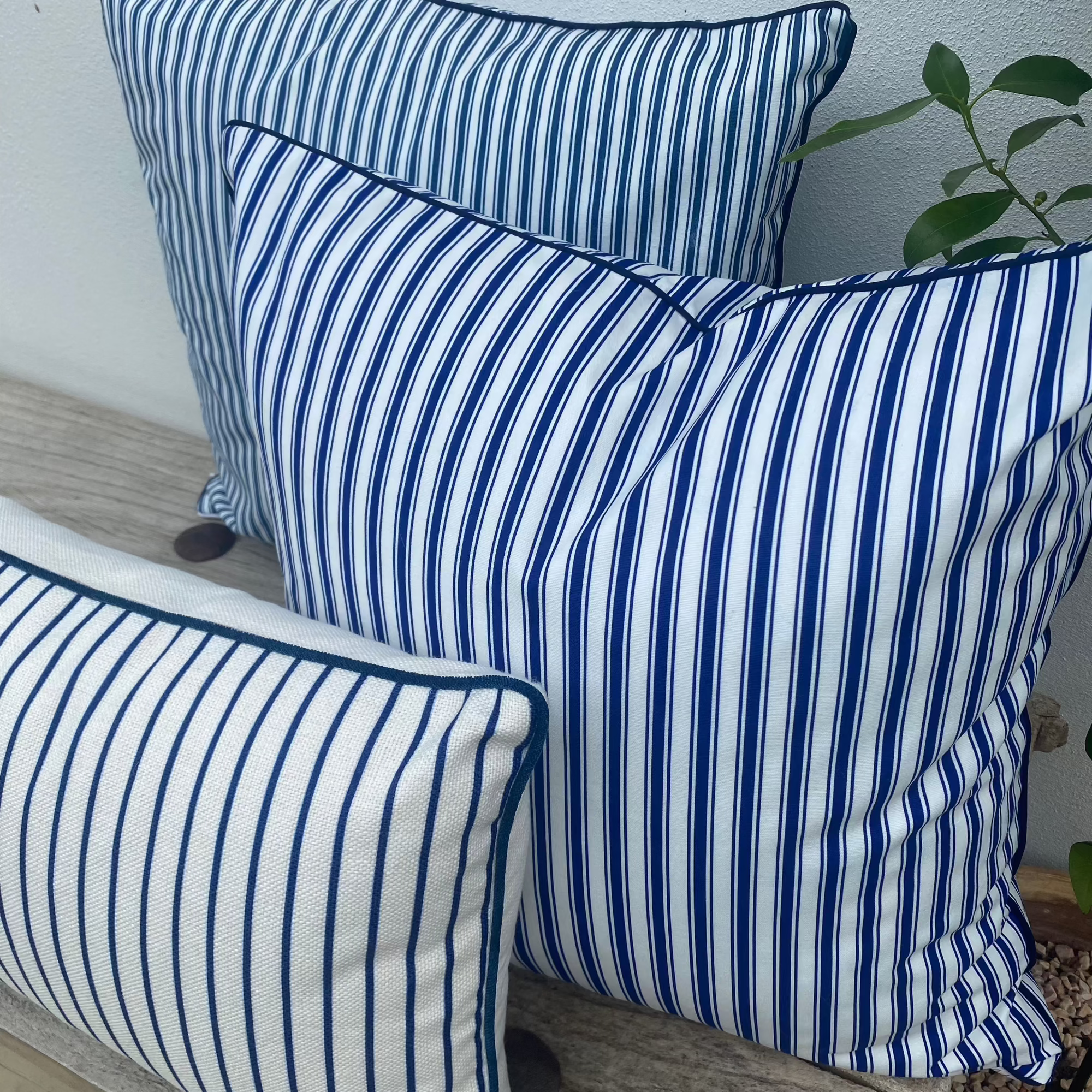 3 Blue and White Pin Striped Cushions