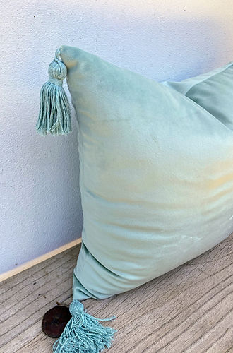 mint-green-tasselled-cushion