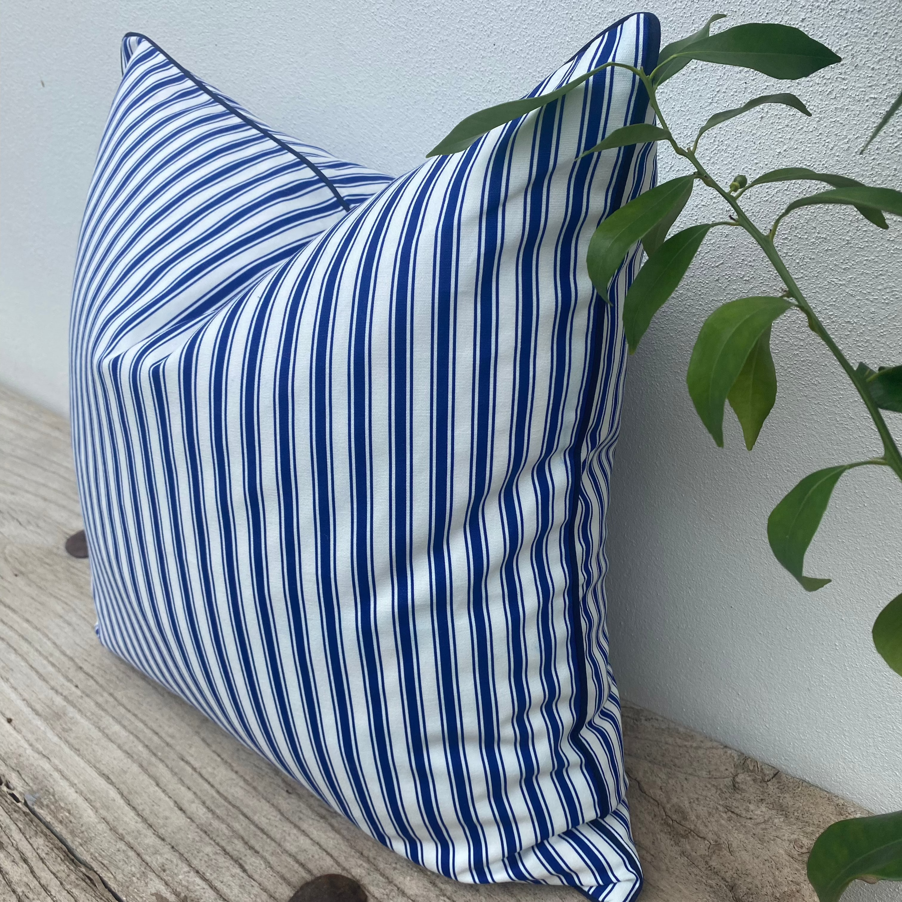 A Cotton Blue and White Pin Stripe Cushion