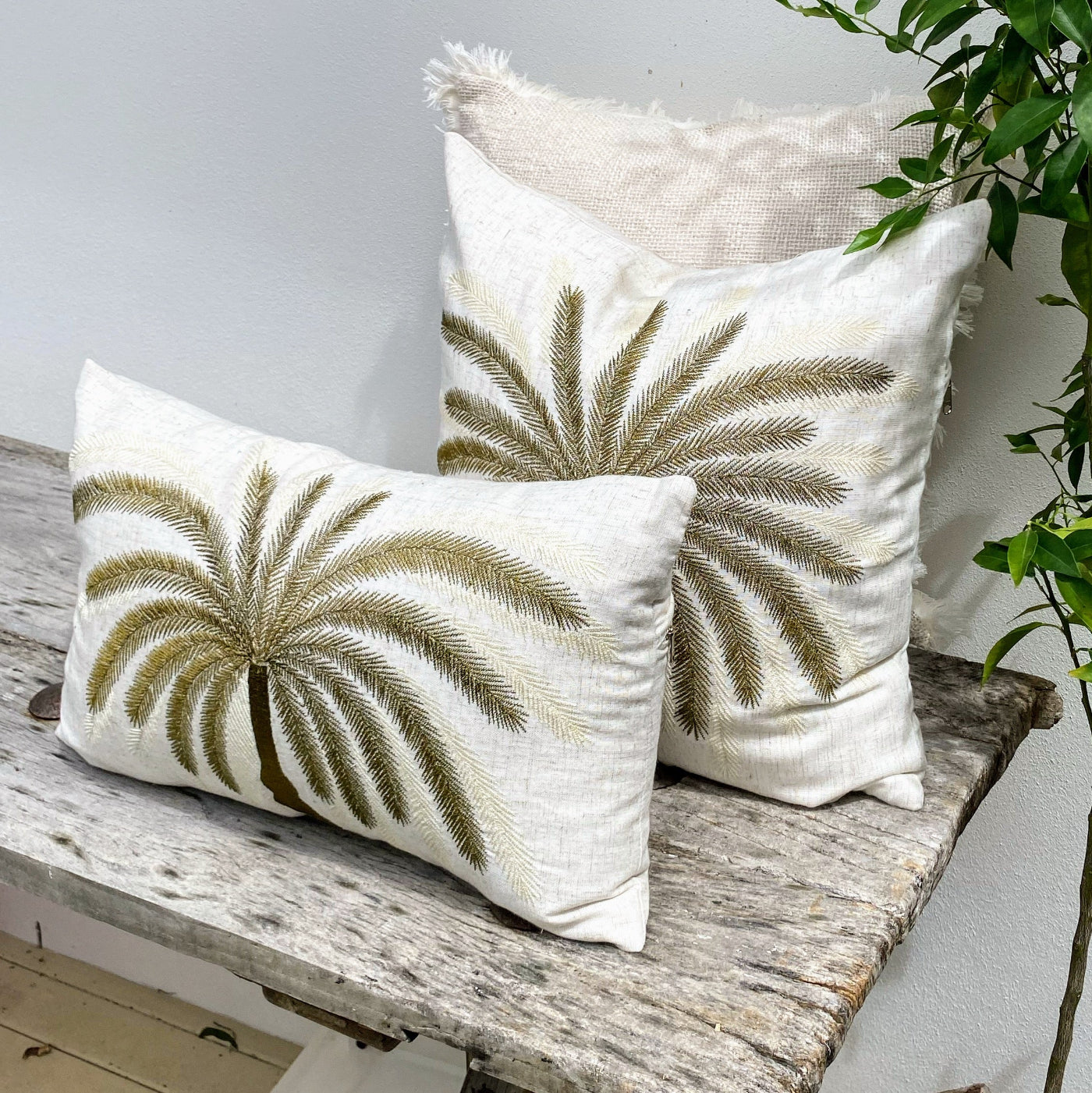 Elegant White Cushion Cover with Tropical Accents